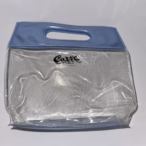 Liz Claiborne curve clear clutch with hook loop closure at handle
